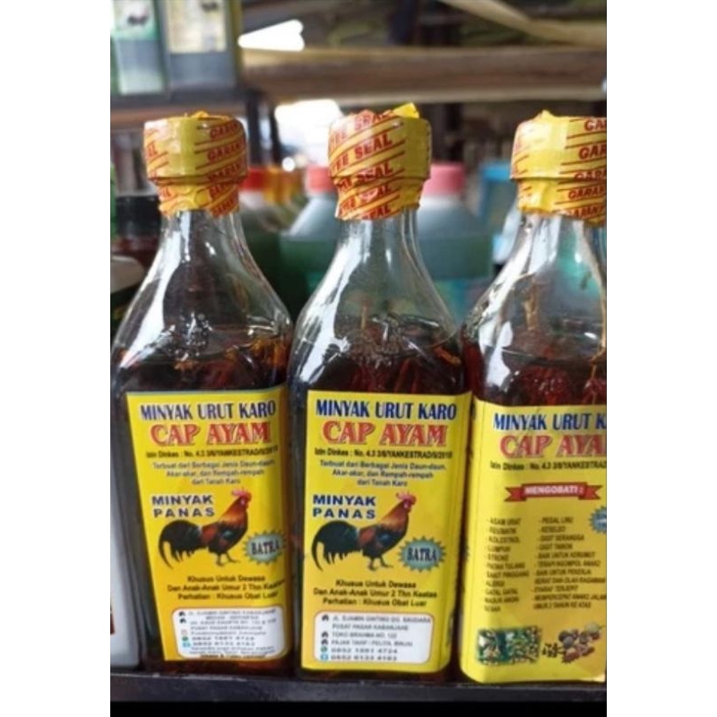 Minyak Urut Karo Panas cap ayam
