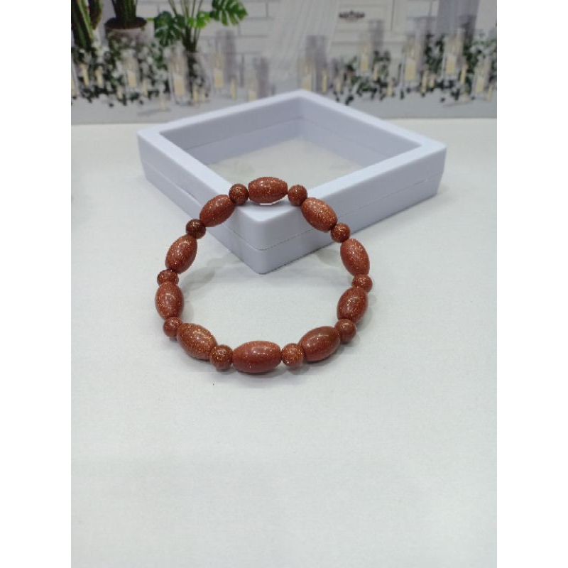 gelang batu pasir emas