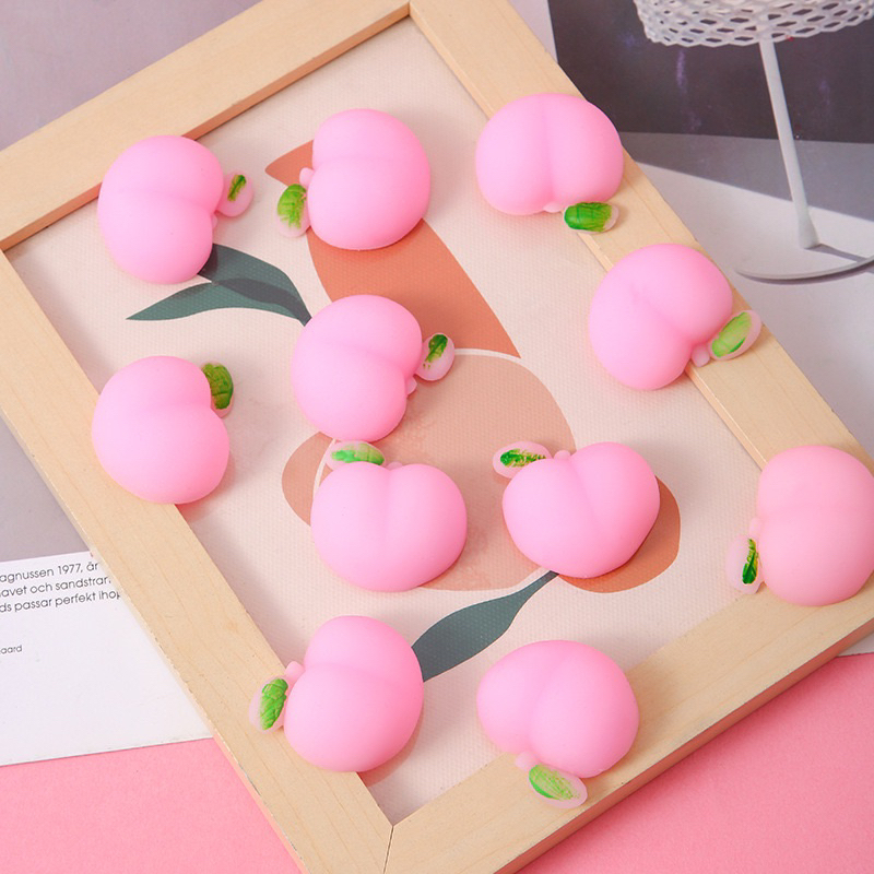 MOMOCUPPY mini moni moni peach stretchy squishy
