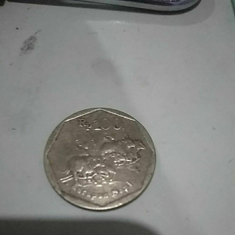 uang kuno Rp 100 gambar karapan sapi