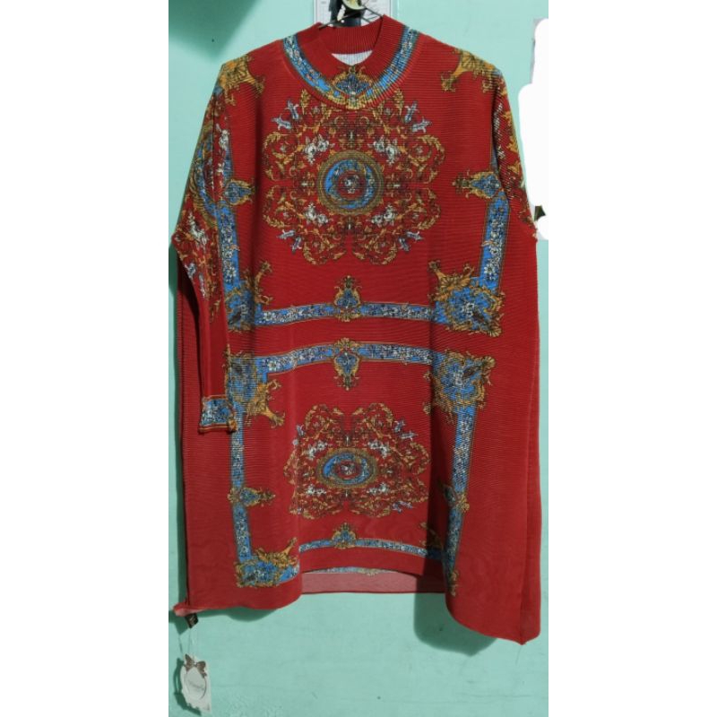 Atasan plisket vivorie