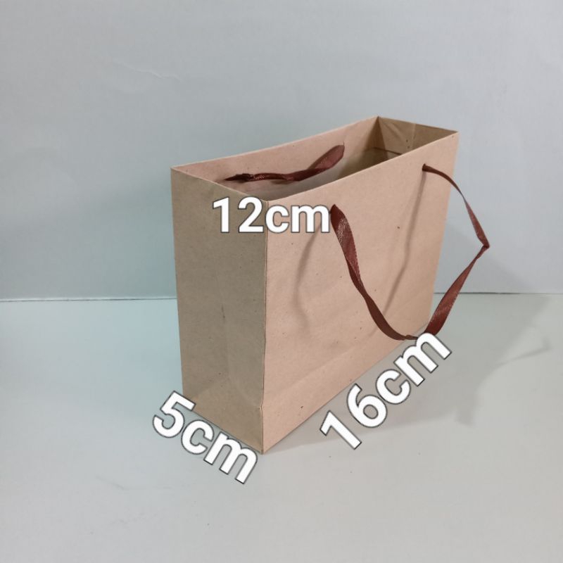 

paperbag polos ukuran(16×5×12)cm isi 12pcs/pack