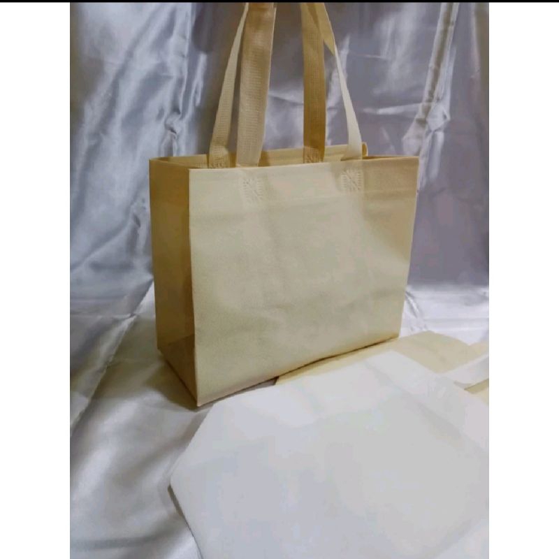 

TAS SPUNBOND/GOODIE BAG BOX LANDSCAPE UK. 27x22x12 + SABLON ( FREE DESAIN!!! )
