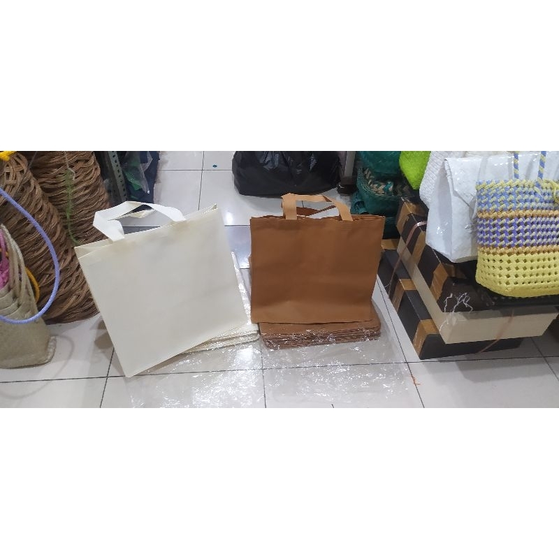 

tas kain spunbond buat bento besar isi 12 pcs (34*26*34)