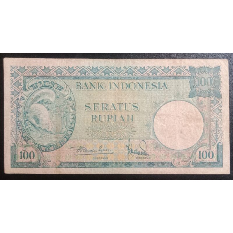 UANGKUNO 100 RUPIAH TUPAI THN 1957