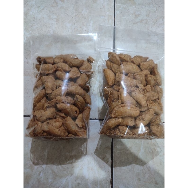 

Aneka Cemilan ( Repack ) Pastel Abon Zidan Kemasan 1 KG