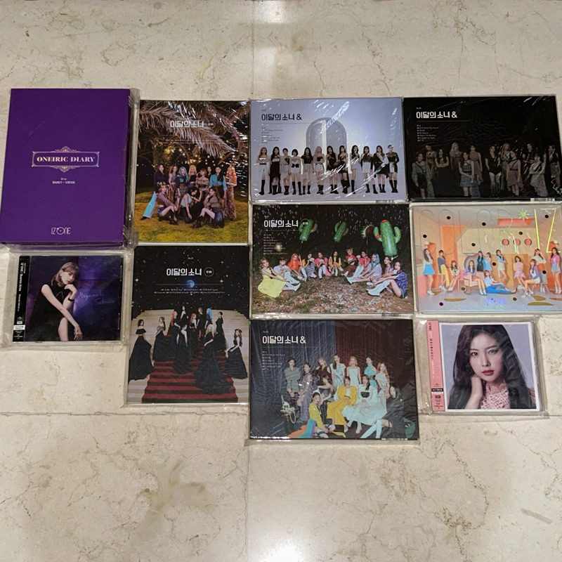 Album IZONE LOONA Unsealed