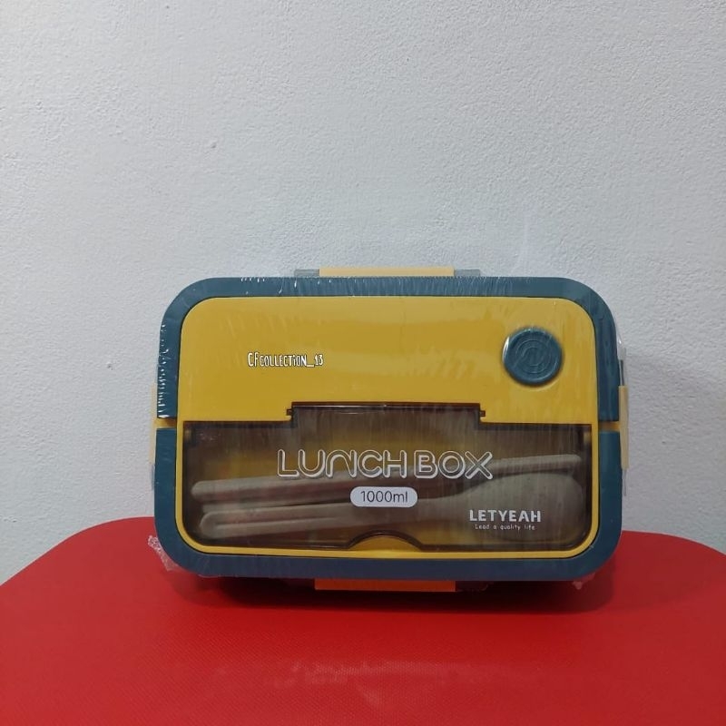Kotak makan / kotak bekal / lunch box warna biru tua dan kuning