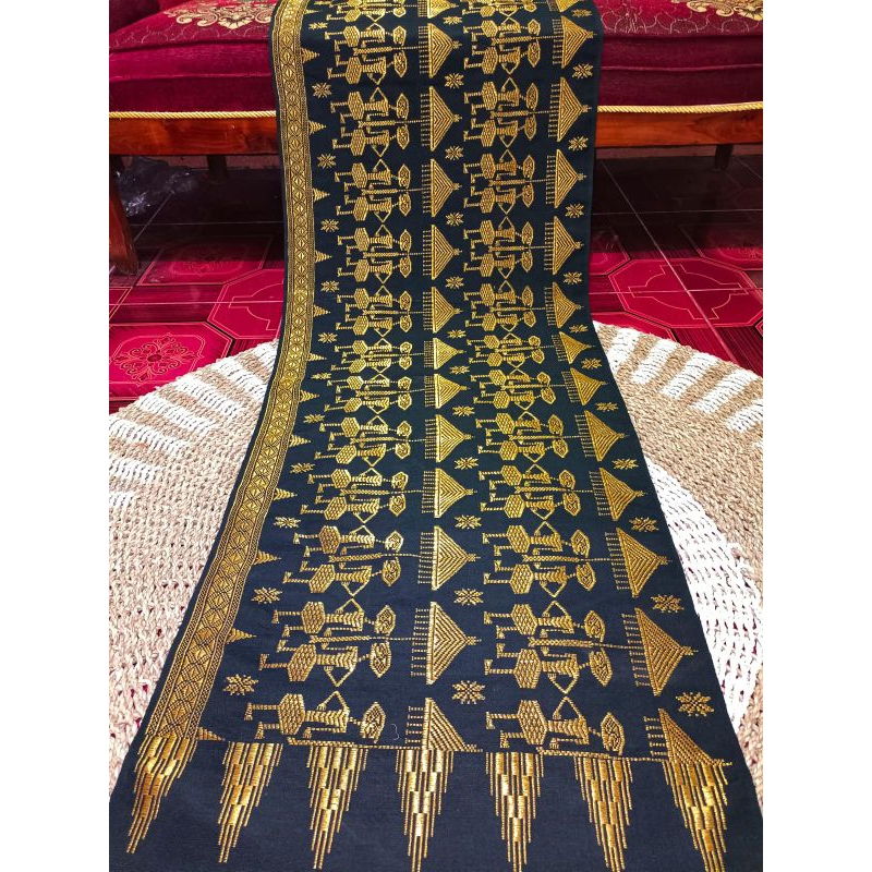 Kain songket asli tenunan