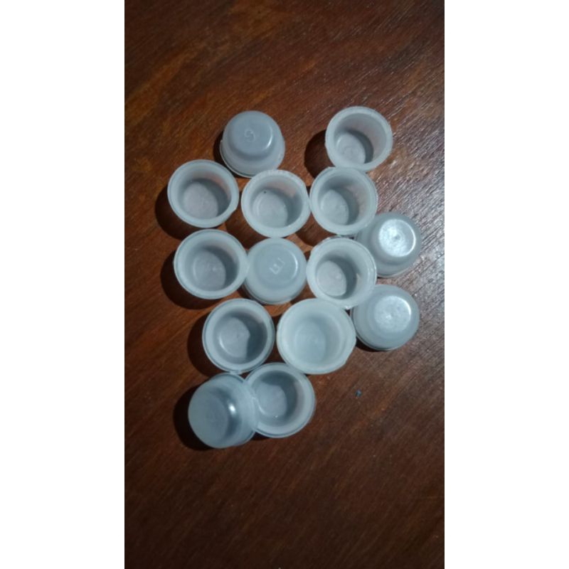 tutup dalam botol marjan