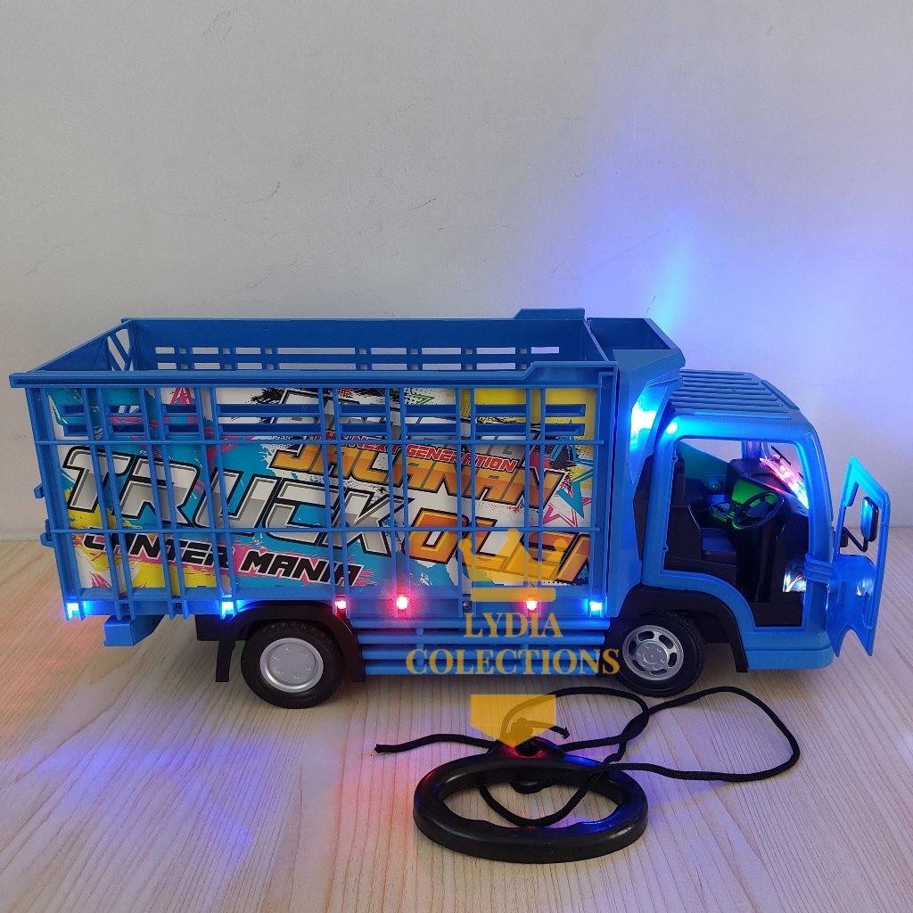 Mainan Truk Basuri Oleng Telolet Jumbo Lampu Bisa Tarik