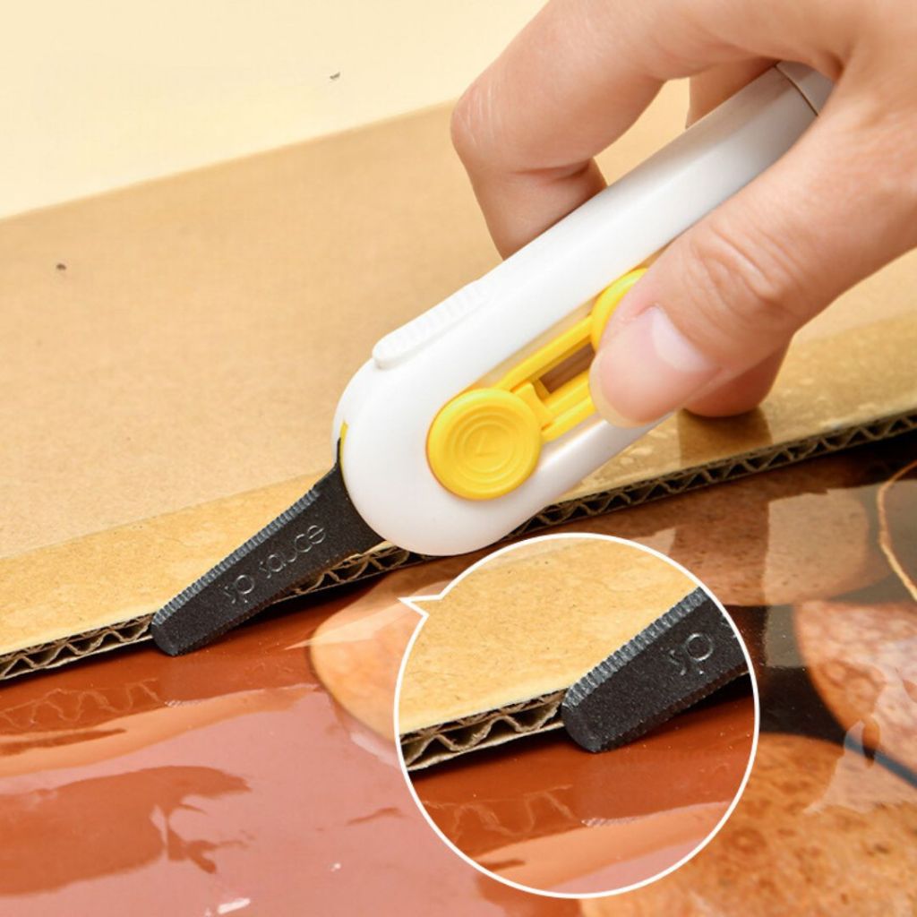

Pisau Cutter Pembuka Paket Magnetik Portabel Anti Lengket Aman Tidak Merusak Isi Paket