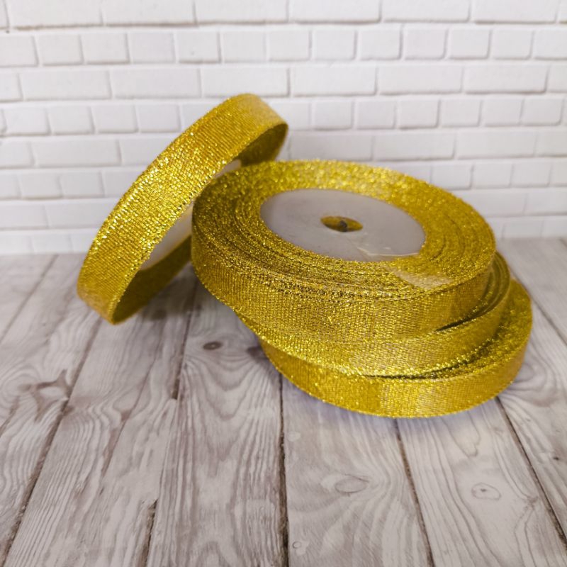 

Pita Glitter Gold dan Silver Ukuran 2 cm Per Roll Panjang 15 meter Import Taiwan untuk Hampers// Dekorasi Parcel Hiasan//Dekorasi Untuk Souvenir