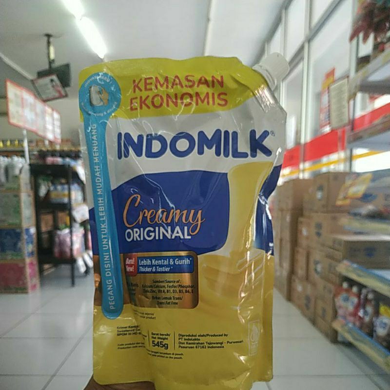 

Indomilk original dan Indomilk Swiss choco kemasan 545 gram