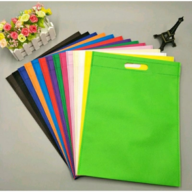 Tas Spunbond Oval Ukuran 20x25 | Tas Hajatan Polos