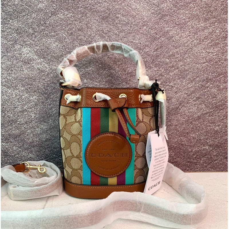 Tas COACH Mini Dempsey Bucket Bag Signature Stripe With Patch Jacquard