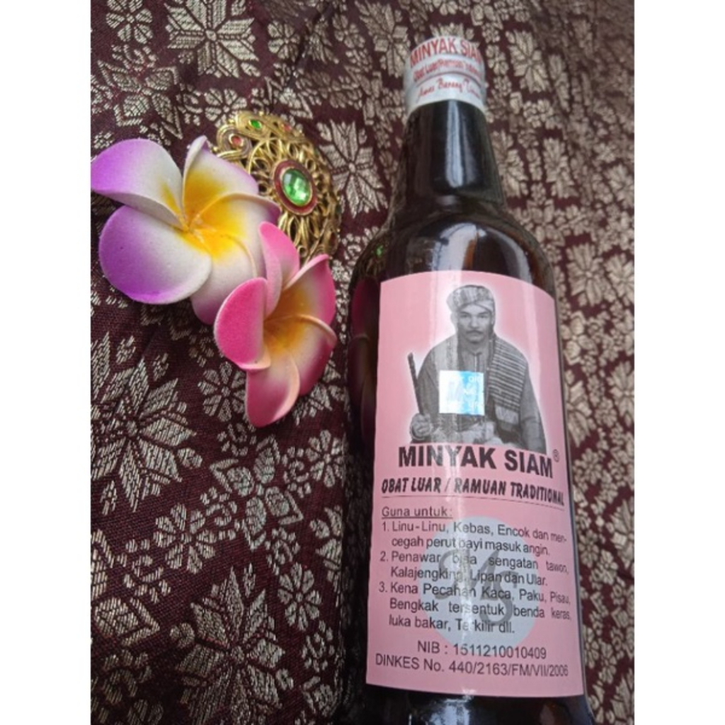 minyak karo minyak siam minyak urut gosok tradisional herbal berkhasiat ASLI 100% bersegel putuwangi