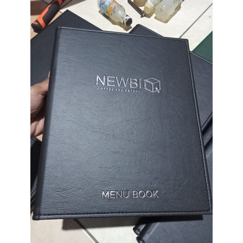 

cover menu resto caffe& hotel dll size a4 logo di embos model dalam di ring