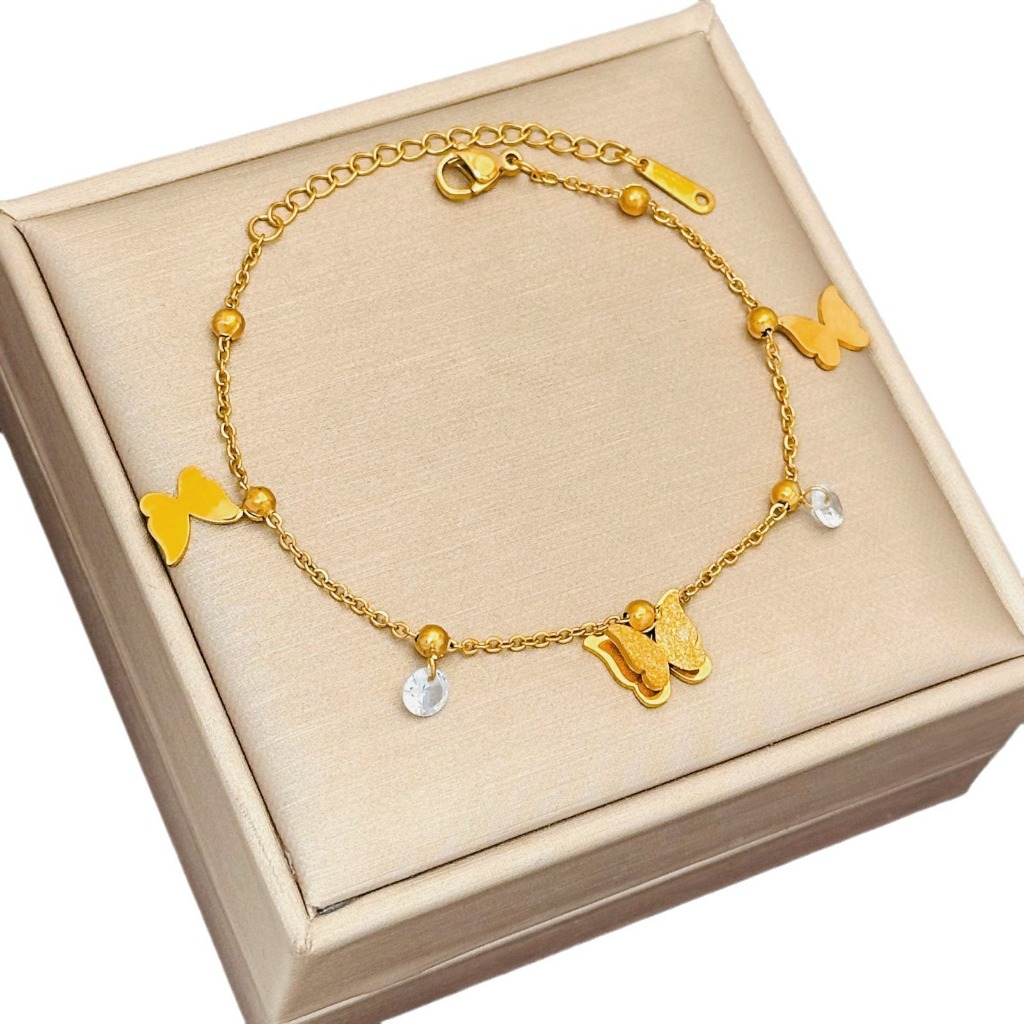 Gelang Kupu Mata Putih Titanium Premium