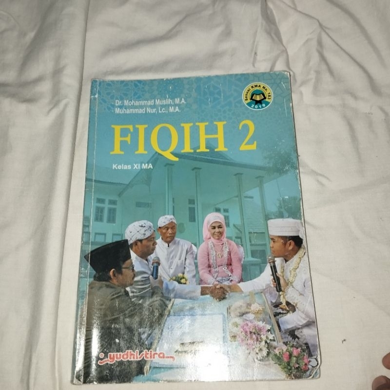 (BEKAS) BUKU FIQIH KELAS 11/XI Yudistira