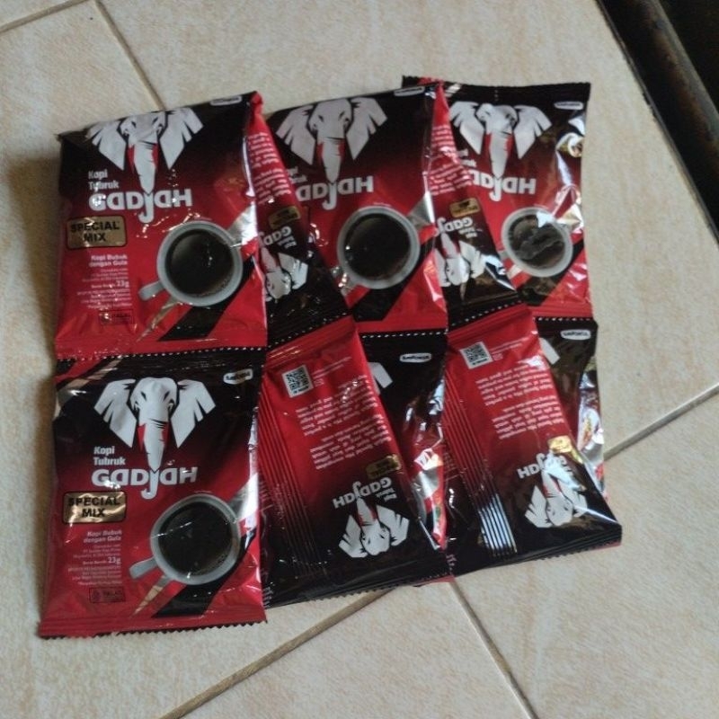 

Kopi Gadjah Special Mix - 1 renteng (10 pcs)