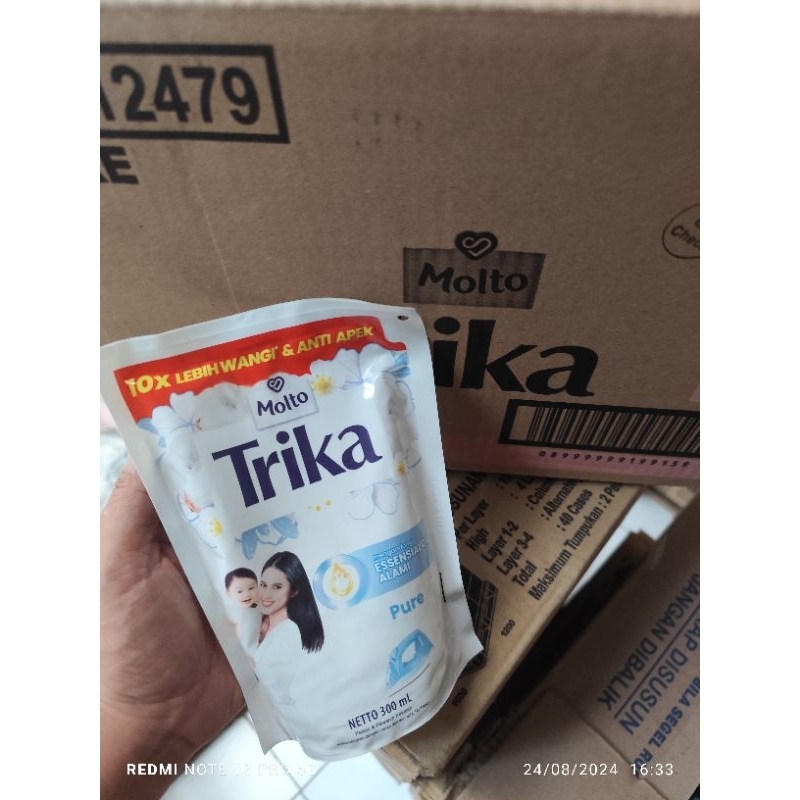 Trika 300ml pelicin pakaian