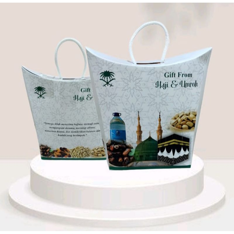 

dus tali kemasan untuk oleh"haji & umrah 1pak isi 50pcs