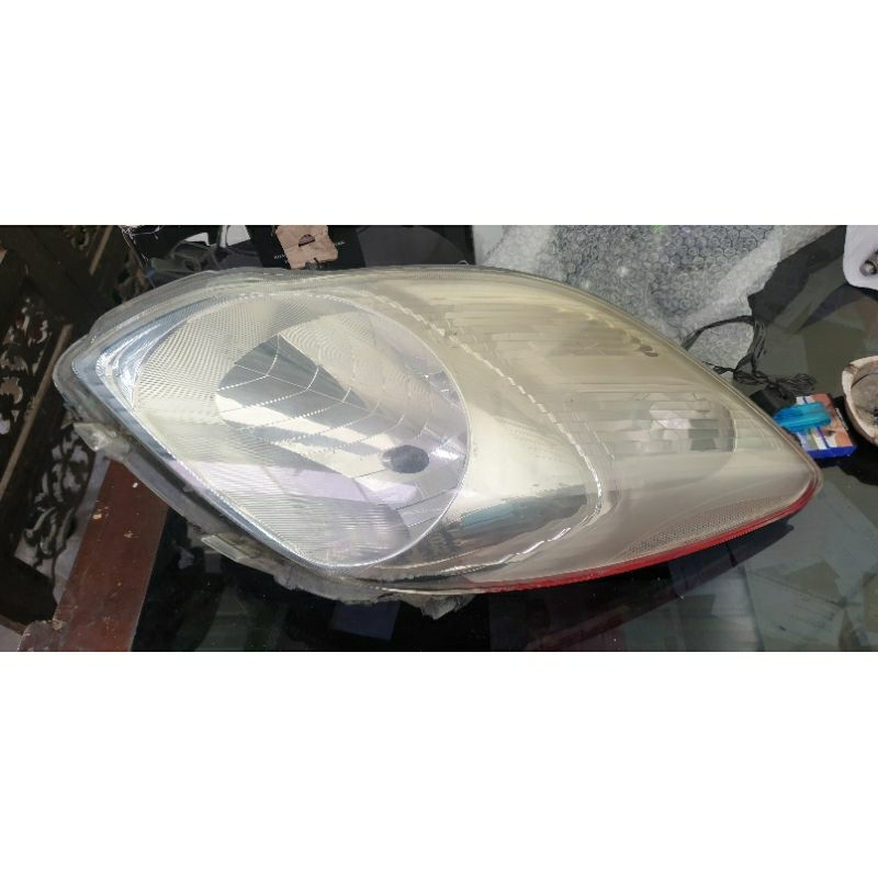 headlamp yaris bakpao th09-12 kiri (second orisinil)
