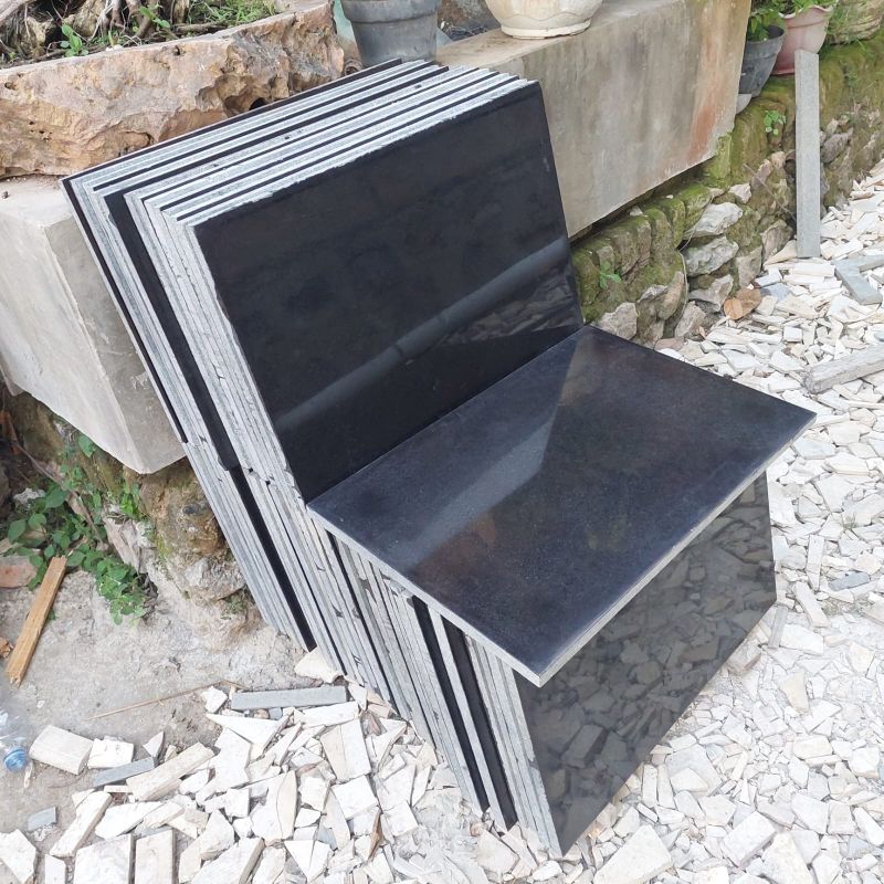 Lembaran batu granit hitam glossy dan siku