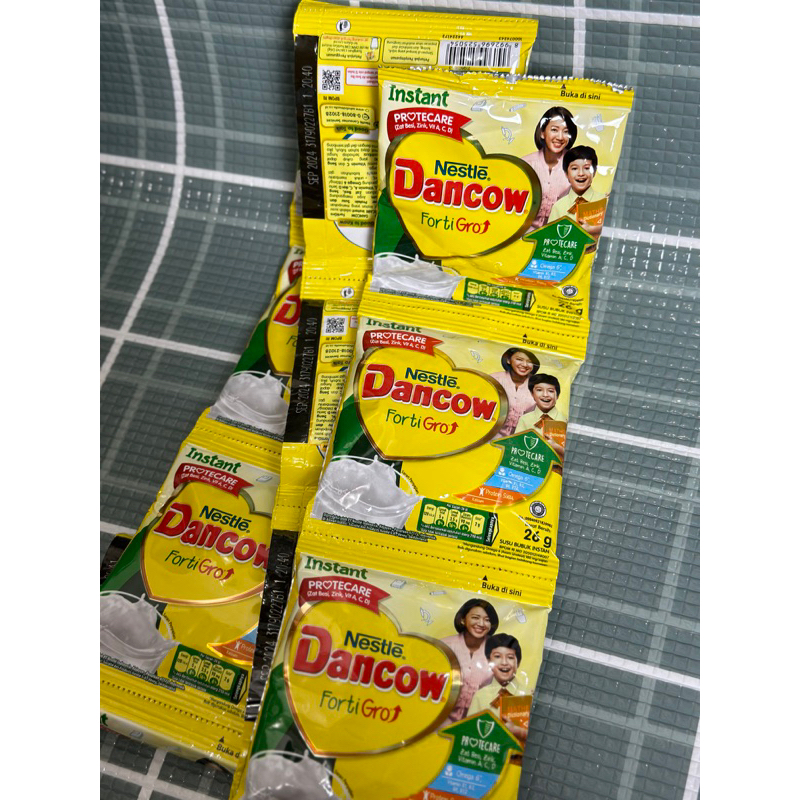 

Dancow instan Kemasan Sachet 26gr (isi 10bks)