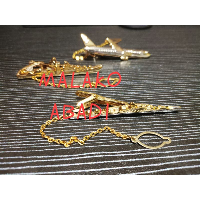 Jepitan dasi perhubungan Udara dan perhubungan laut