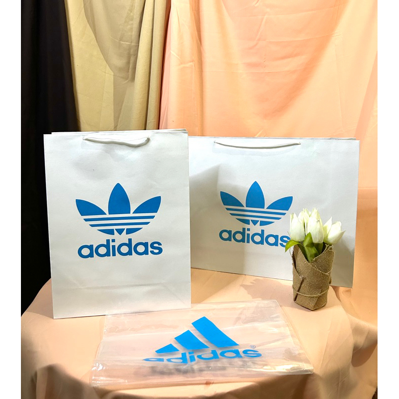 

Paper Bag Adidas Putih Biru Pembungkus Kado ( READY STOCK JKT )