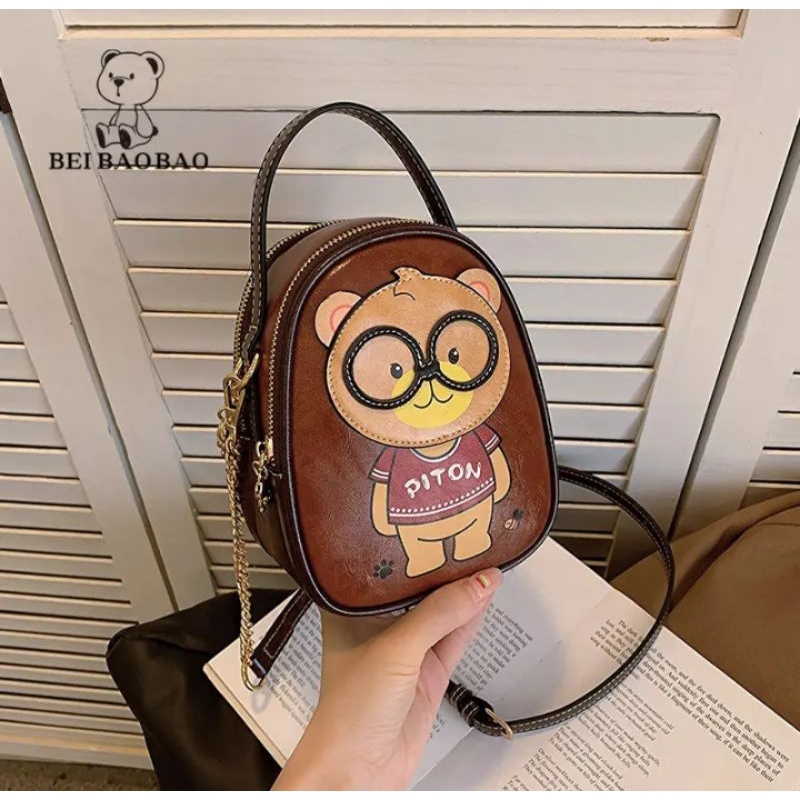 tas import piton bear kacamata original EMBOSS model telur