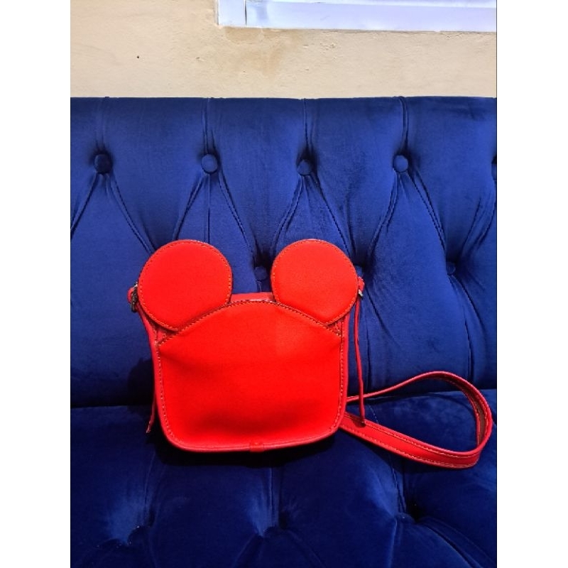 coach and disney sling bag