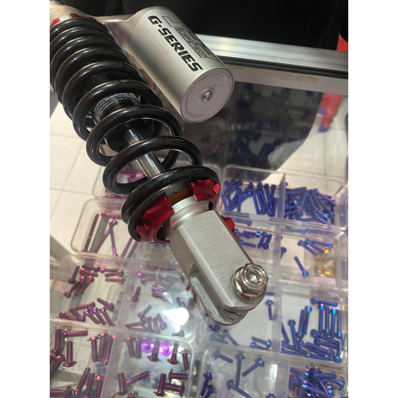 baut shock belakang mio