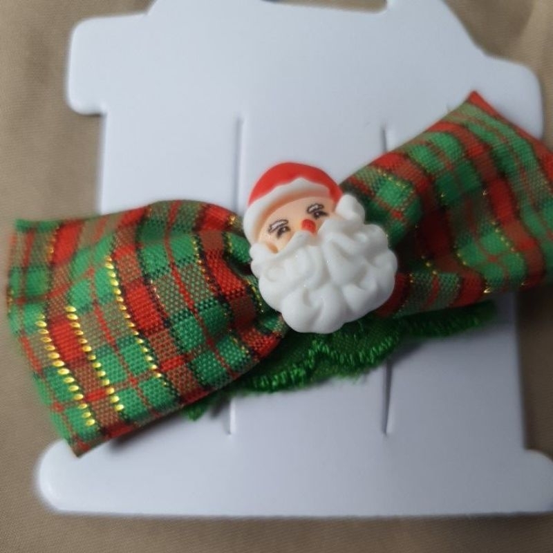 Jepitan Natal kain satuan motif