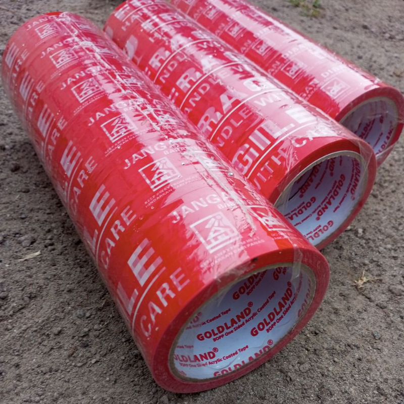 

Lakban Printing FRAGILE Merk Gold Land 48 mm x 50 m Grosir