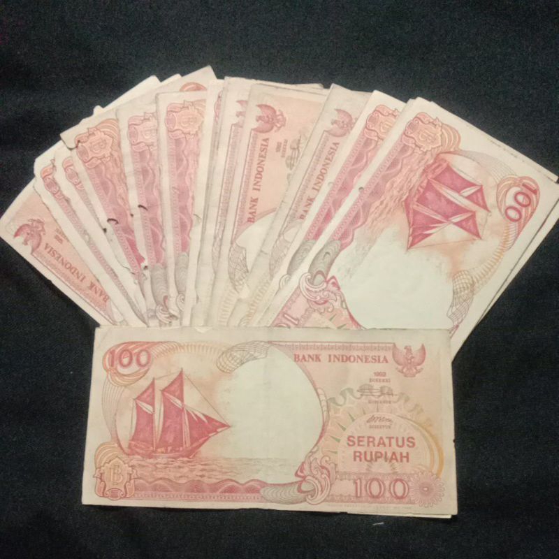 100 rupiah perahu pinisi tahun 1992 satu gepok nomer seri acak kreasi rayap