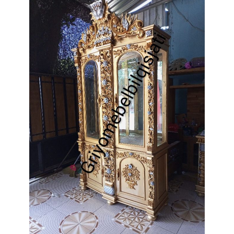 lemari hias jati ukir Sima gold
