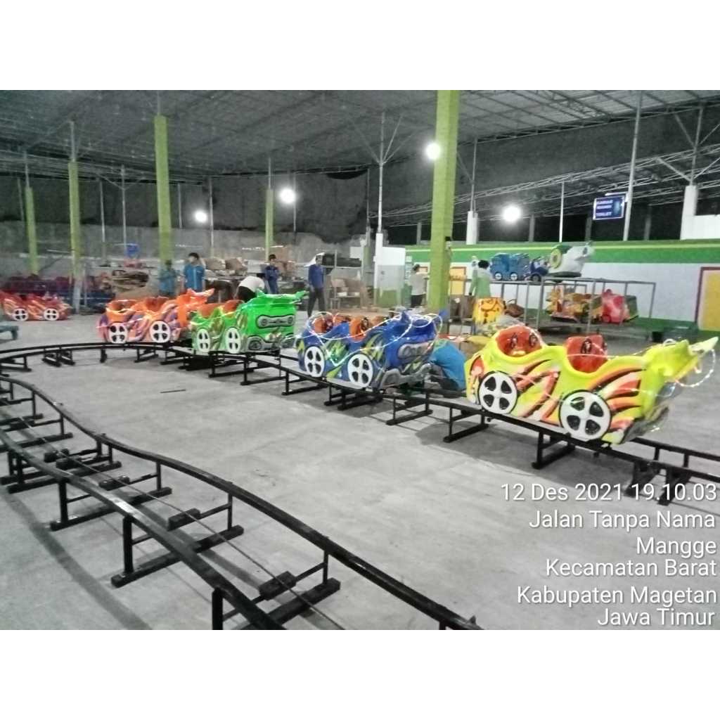 kereta mini coaster rell naik turun