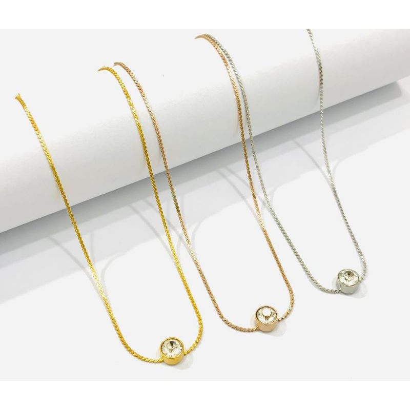 kalung titanium motif liontin mata satu