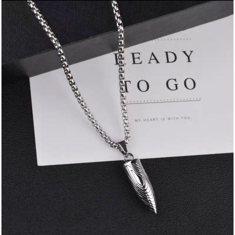 KALUNG TITANIUM PRIA BANDUL PELURU SILVER KEREN