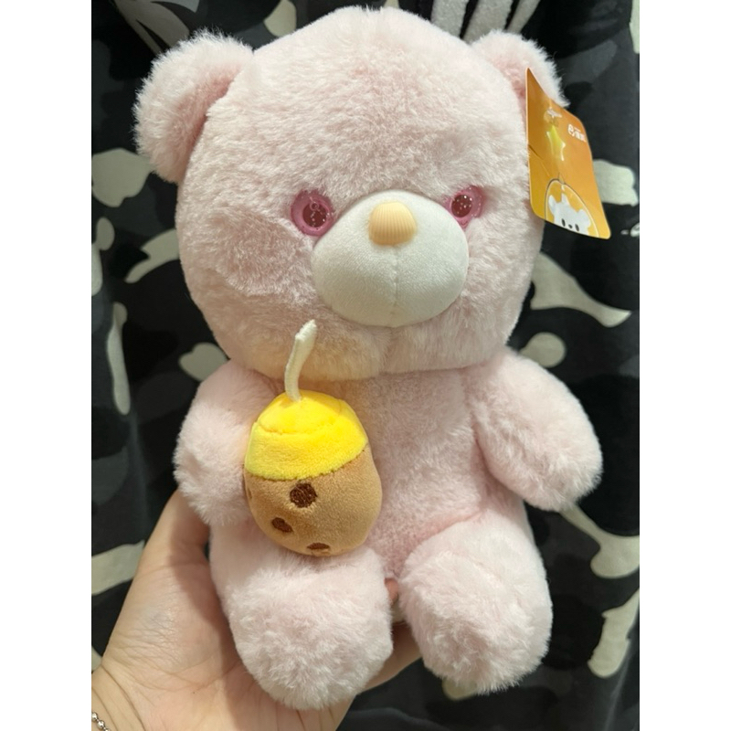 Boneka beruang pink pegang boba boneka mata permen hidung kerang