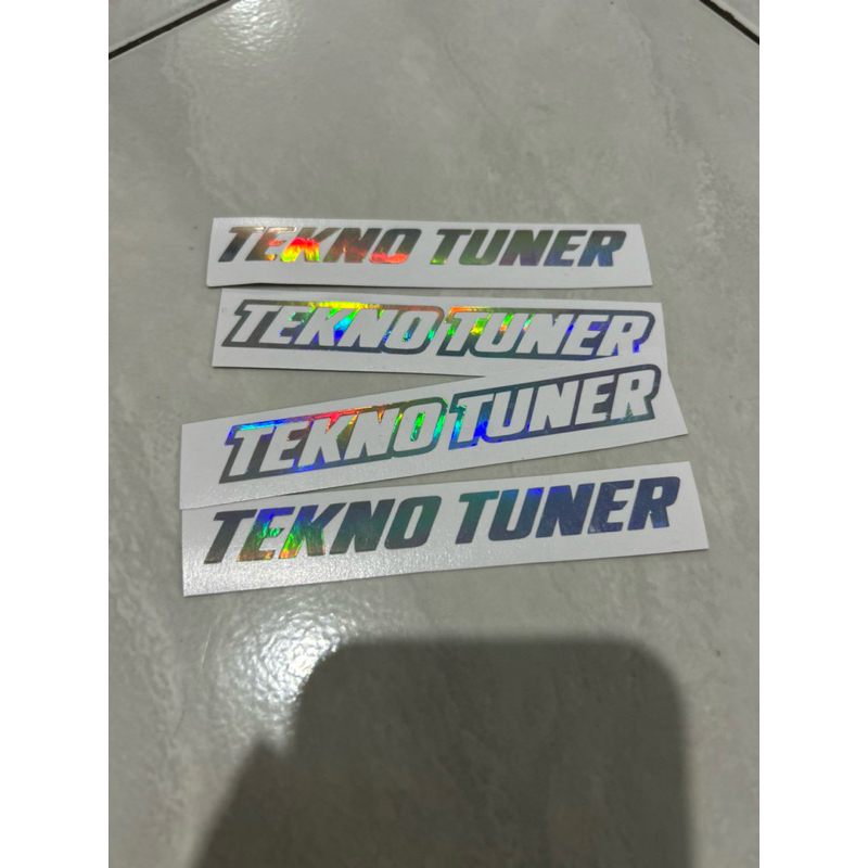 

STIKER TEKNO TUNER HOLOGRAM / PUTIH PANJANG 12 cm x 1,7 cm