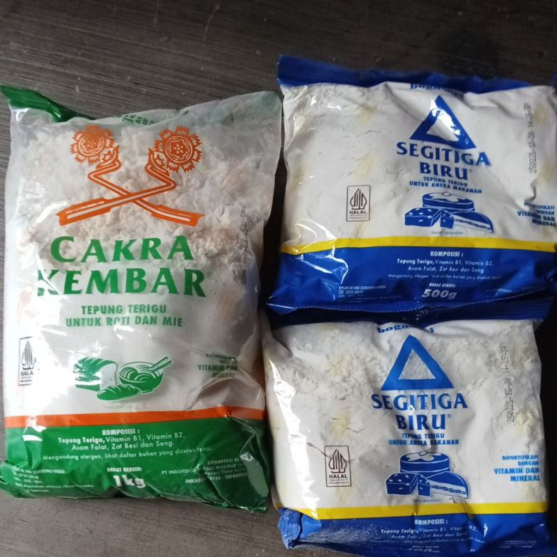 

Tepung terigu CAKRA KEMBAR & SEGITIGA BIRU uk. 500gr dan 1 kg