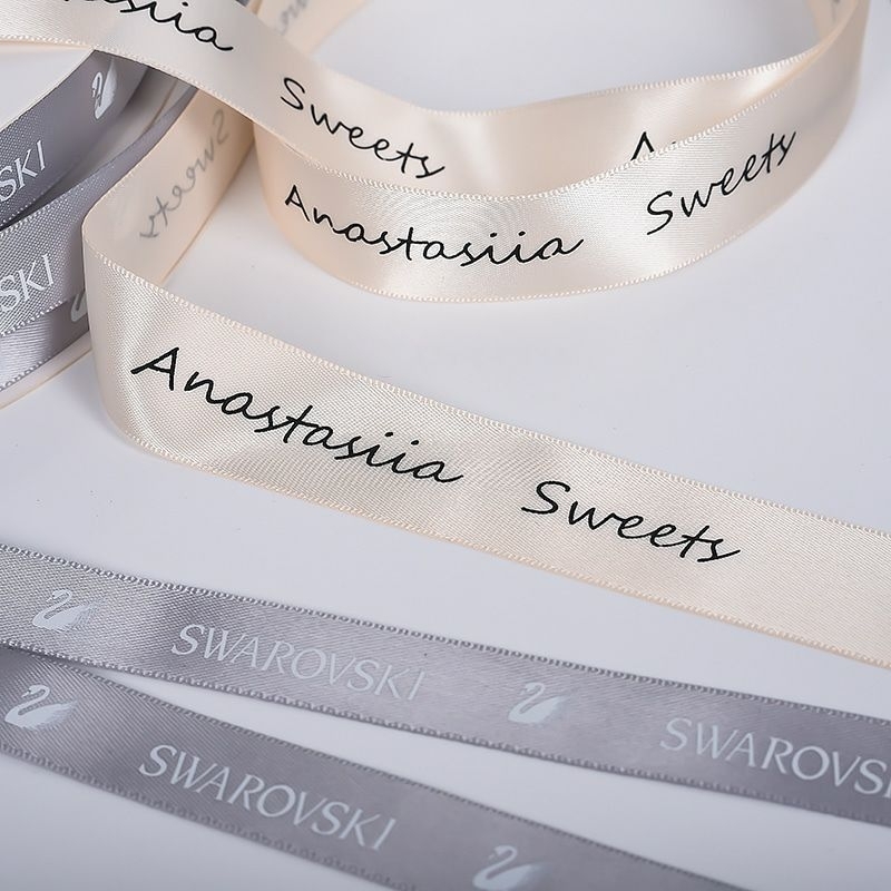 

label pita satin sablon ukuran 1.2cm 2cm 3cm untuk label nama souvenir dll