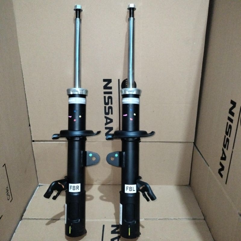 shockbreeaker nissan almera depan orihummgiinal
