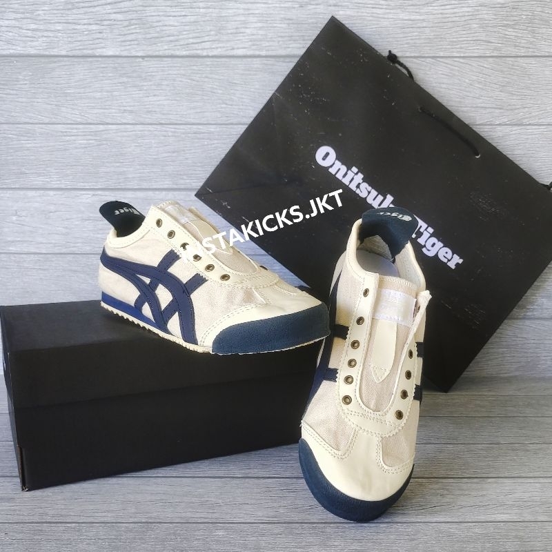 Sepatu Slip On Wanita Pria Cream Navy Kanvas Slip On Wanita