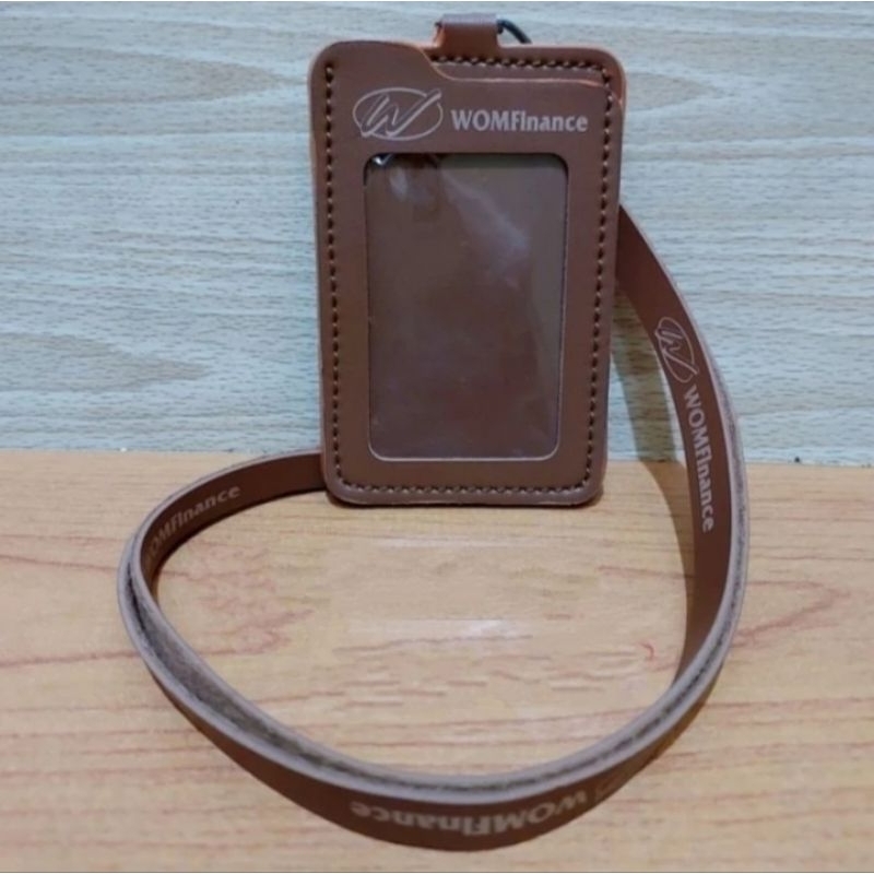

HOLDER KALUNG ID CARD LOGO WOM FINANCE COKLAT BEST QUALITY PREMIUM