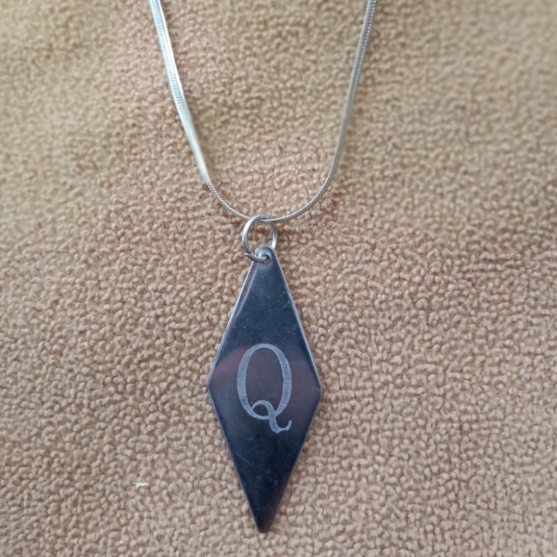 Kalung titanium liontin ikspi kera sakti
